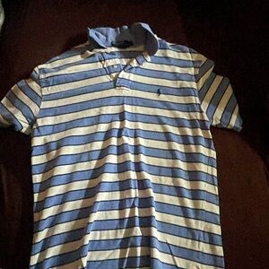 Size large Ralph Loren polo shirt. Used and hardly worn in great condition